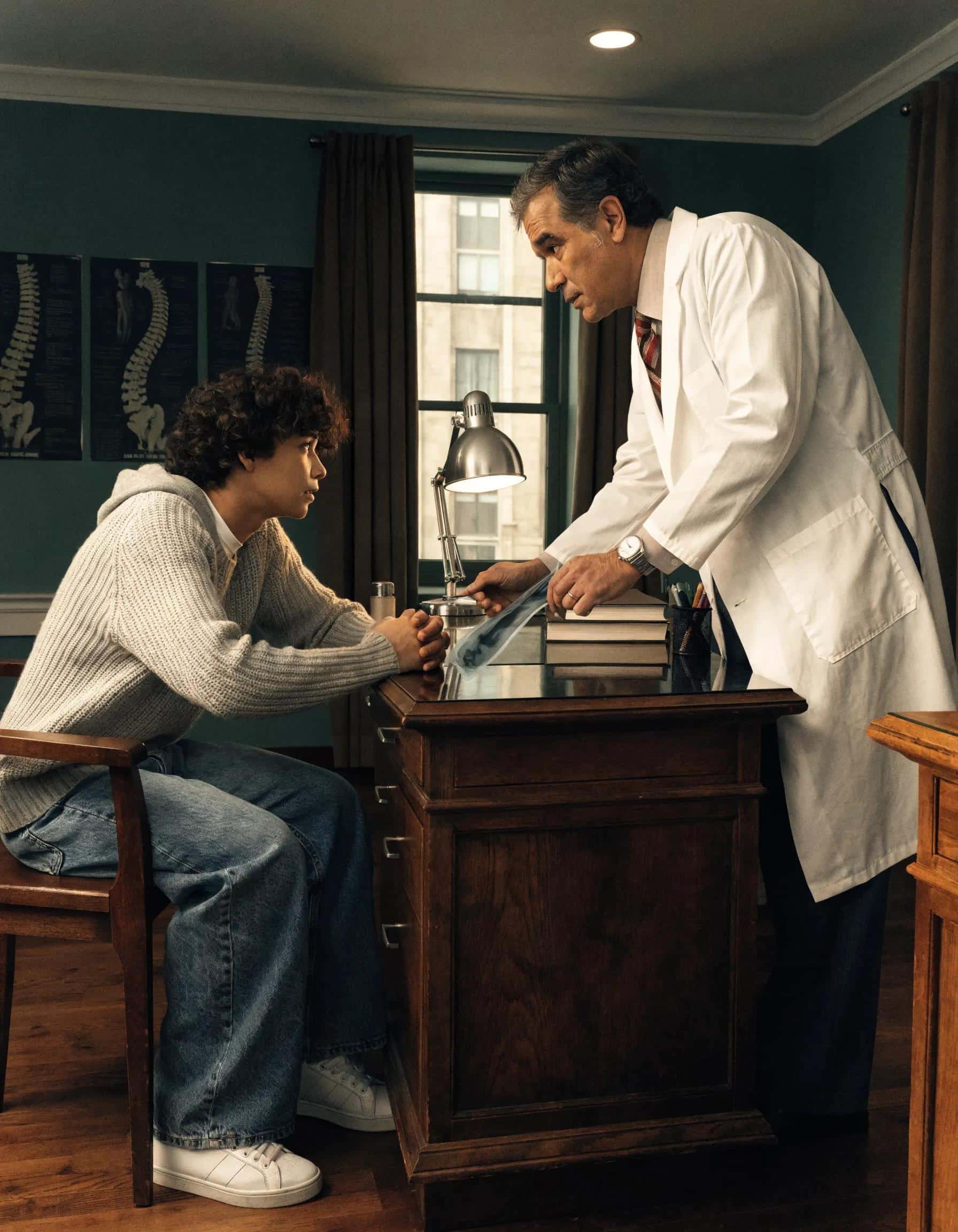 Patient discussing risks of spinal surgery with a doctor